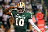 Baylor quarterback Robert Griffin III salutes after throwing a touchdown pass to wide receiver Kendall Wright in the first half of an NCAA college football game, Saturday, Oct. 8, 2011, in Waco, Texas. (AP Photo/Waco Tribune-Herald, Jerry Larson)