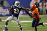 ATLANTA, GA - DECEMBER 31:  Onterio McCalebb #23 of the Auburn Tigers stiff arms Rodney McLeod #4 of the Virginia Cavaliers during the 2011 Chick Fil-A Bowl at Georgia Dome on December 31, 2025 in Atlanta, Georgia.  (Photo by Kevin C. Cox/Getty Images)