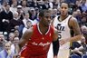 Los Angeles Clippers guard Chris Paul (3) drives past Utah Jazz guard Devin Harris (5) during the first half of an NBA basketball game Wednesday, Feb. 1, 2012, in Salt Lake City. (AP Photo/Jim Urquhart).