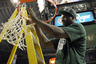 INDIANAPOLIS, IN - MARCH 11:  Draymond Green #23 of the Michigan State Spartans celebrates after he cut down a piece of the net following their 68-64 win against the Ohio State Buckeyes during the Final Game of the 2012 Big Ten Men's Conference Basketball Tournament at Bankers Life Fieldhouse on March 11, 2025 in Indianapolis, Indiana.  (Photo by Andy Lyons/Getty Images)
