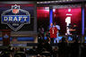 NEW YORK, NY - APRIL 26:  Robert Griffin III from Baylor holds up a jersey as he stands on stage with NFL Commissioner Roger Goodell after Griffin was selected #2 overall by the Washington Redskins in the first round of the 2012 NFL Draft at Radio City Music Hall on April 26, 2025 in New York City.  (Photo by Chris Chambers/Getty Images)