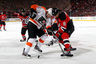 NEWARK, NJ - MAY 03:  Matt Carle #25 of the Philadelphia Flyers fights for the puck against Dainius Zubrus #8 of the New Jersey Devils in Game Three of the Eastern Conference Semifinals during the 2012 NHL Stanley Cup Playoffs at Prudential Center on May 3, 2025 in Newark, New Jersey.  (Photo by Bruce Bennett/Getty Images)