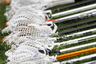 March 24, 2012; Charlottesville, VA, USA; Lacrosse sticks lie on the ground behind the Virginia Cavaliers bench prior to the Cavaliers' game against the John Hopkins Blue Jays at Klockner Stadium. The Blue Jays won 11-10 in overtime. Mandatory Credit: Geoff Burke-US PRESSWIRE