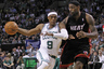 June 1, 2012; Boston, MA, USA; Boston Celtics point guard Rajon Rondo (9) drives against Miami Heat forward LeBron James (6) during the fourth quarter in game three of the Eastern Conference finals of the 2012 NBA playoffs at TD Garden.  The Boston Celtics won 101-91.  Mandatory Credit: Greg M. Cooper-US PRESSWIRE