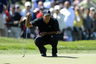 June 15, 2012; San Francisco, CA, USA; Tiger Woods lines up his shot attempt on the 3rd hole during the second round of the 112th U.S. Open golf tournament at The Olympic Club. Mandatory Credit: Ron Chenoy-US PRESSWIRE