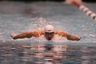 Mar 31, 2012; Indianapolis, IN, USA; Michael Phelps swims the butterfly in the men's 200 meter individual medley during the championship final  at the Indianapolis Grand Prix at the Indiana University Natatorium. Michael Phelps set a record time in the event.  Mandatory Credit: Brian Spurlock-US PRESSWIRE
