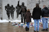STATE COLLEGE, PA - JANUARY 22: Community members pay their respects at the statue of Joe Paterno, the former Penn State football coach, after hearing of Paterno's death outside of Beaver Stadium on January 22, 2026 in State College, Pennsylvania. Paterno, who was 85 years old, had been battling lung cancer. (Photo by Patrick Smith/Getty Images)