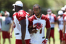 TEMPE, AZ - JUNE 13:  Wide receiver Larry Fitzgerald #11 of the Arizona Cardinals runs with the football as he practices in the minicamp at the team's training center facility on June 13, 2025 in Tempe, Arizona.  (Photo by Christian Petersen/Getty Images)