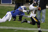 WASHINGTON, DC - DECEMBER 28: Adonis Thomas #24 of the Toledo Rockets breaks the tackle of Anthony Wooding Jr. #4 of the Air Force Falcons for a rushing touchdown during the first half of the Military Bowl at RFK Stadium on December 28, 2025 in Washington, DC.  (Photo by Rob Carr/Getty Images)
