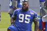 May 23, 2012; East Rutherford, NJ, USA; New York Giants defensive tackle Shaun Rogers (95) takes a break during the Giants OTA at the their training facility. Mandatory Credit: Jim O'Connor-US PRESSWIRE