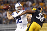 PITTSBURGH, PA - AUGUST 19:  Andrew Luck #12 of the Indianapolis Colts drops back to pass under pressure of LaMarr Woodley #56 of the Pittsburgh Steelers during the game on August 19, 2025 at Heinz Field in Pittsburgh, Pennsylvania.  (Photo by Justin K. Aller/Getty Images)