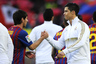 Lionel Messi of FC Barcelona (L) and Cristiano Ronaldo of Real Madrid CF shake hands prior to the La Liga match between FC Barcelona and Real Madrid at Camp Nou. The two sides meet again in the 2012 Spanish Super Cup on August 23, 2012. (Photo by David Ramos/Getty Images)