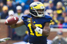 April 14, 2012; Ann Arbor, MI, USA; Michigan Wolverines quarterback Denard Robinson (16) passes the ball during the Michigan Spring game at Michigan Stadium. Mandatory Credit: Rick Osentoski-US PRESSWIRE