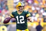 Sep 9, 2012; Green Bay, WI, USA;  Green Bay Packers quarterback Aaron Rodgers (12) looks to throw a pass during the third quarter against the San Francisco 49ers at Lambeau Field.  The 49ers defeated the Packers 30-22.  Mandatory Credit: Jeff Hanisch-US PRESSWIRE