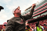 LINCOLN NE - OCTOBER 30: Coach Bo Pelini of the Nebraska Cornhuskers pumps his fist to the Husker faithful after their game against the Missouri Tigers at Memorial Stadium on October 30 2010 in Lincoln Nebraska. Nebraska Defeated Missouri 31-17. (Photo by Eric Francis/Getty Images)