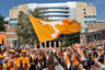 Sep 15, 2012; Knoxville, TN, USA; Tennessee Volunteers pioneer mascot flag bearer waves the flag during the Vol Walk outside Neyland Stadium prior to the game against the Florida Gators. Mandatory Credit: Jim Brown-US PRESSWIRE