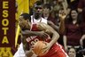 Ohio State forward David Lighty, front, drives inside against Minnesota guard Chip Armelin during the second half of an NCAA college basketball game Sunday, Feb. 6, 2011, in Minneapolis. Ohio State won 82-69. (AP Photo/Paul Battaglia)